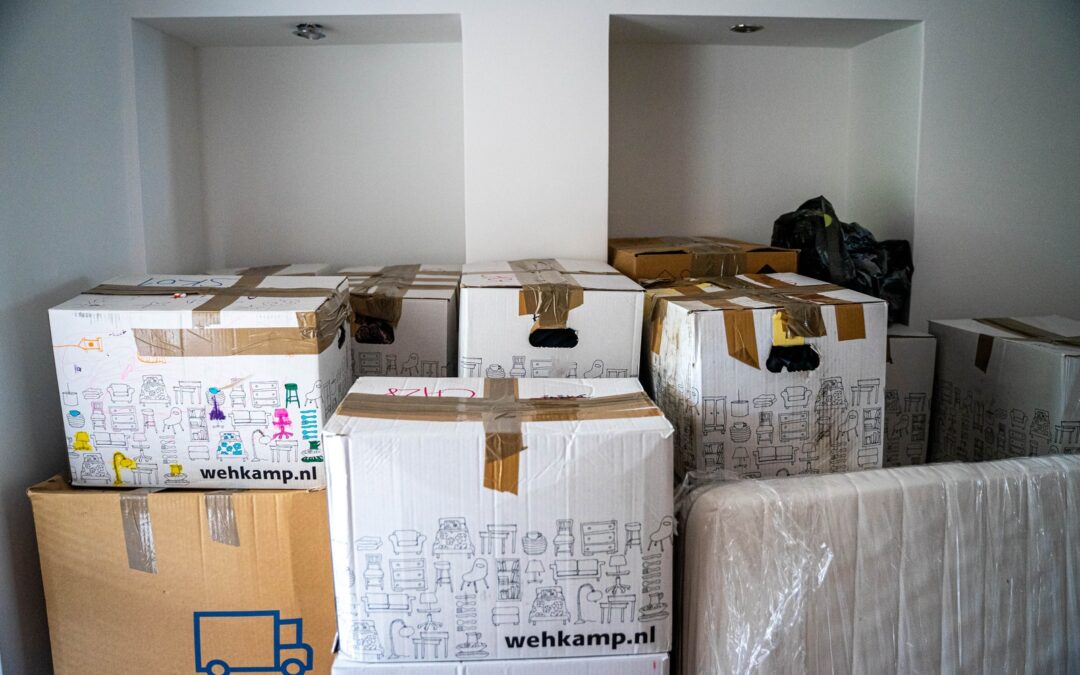 brown cardboard boxes on brown wooden table